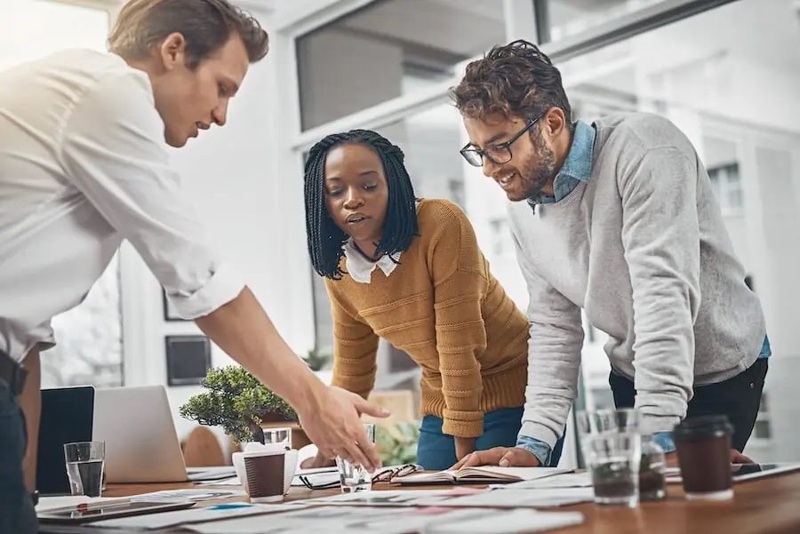 Agency team working around table